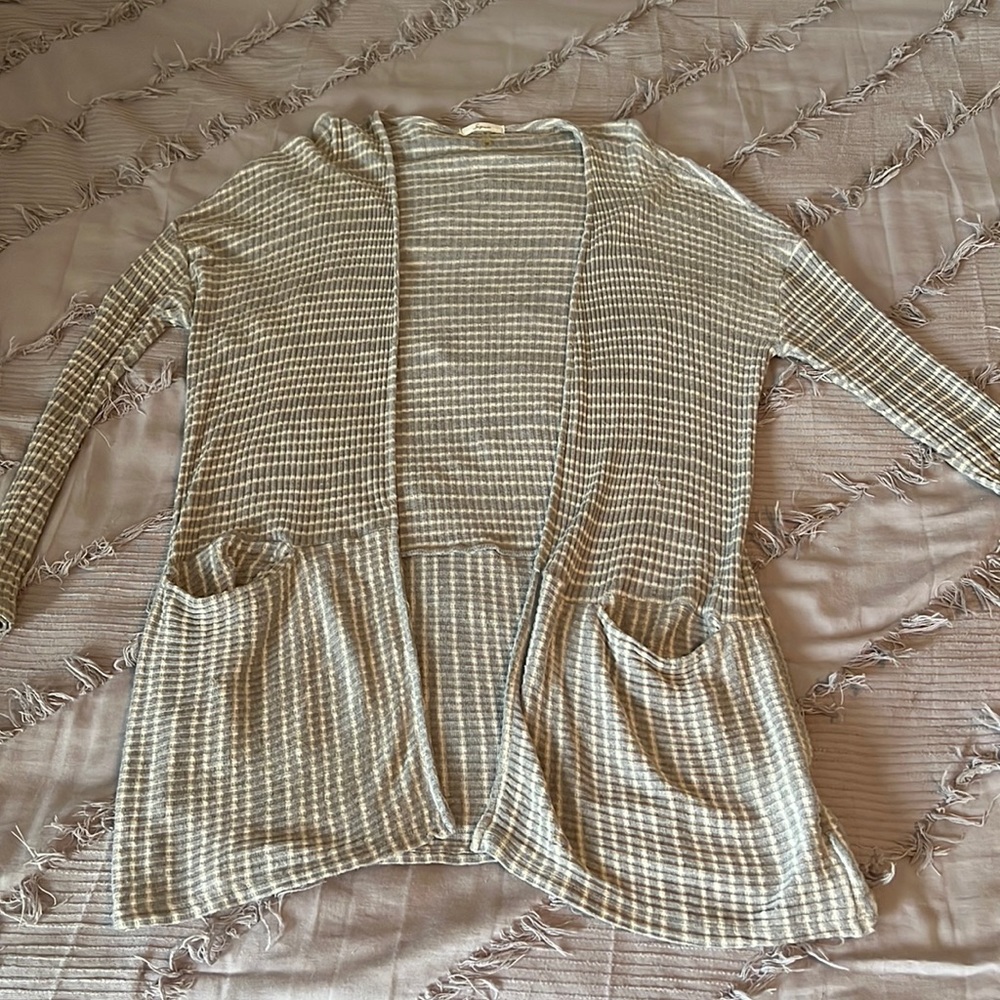 Grey and white stripped cardigan.